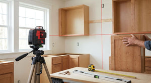 How to use a cross line laser for cabinet installation