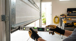 Digital spirit level for garage door installation