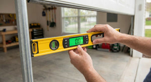 How to use a digital spirit level for garage doors