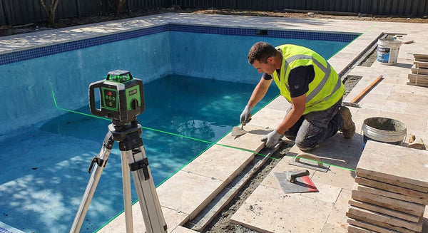 Laser level for swimming pool tiling and coping