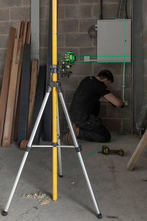 Grettz G-GTP tripod and pole set in use on site with a laser level mounted