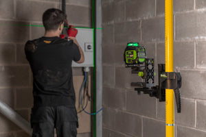 Grettz G-GTP pole-mounted laser level in use on site — lifestyle view