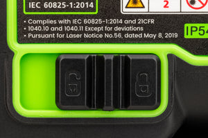 Close-up of the Grettz G4D 4D multi-line green beam laser showing CE and UKCA certification labels and power switch