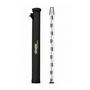 Grettz 4m telescopic levelling staff extended next to its black padded Grettz Precision carry bag